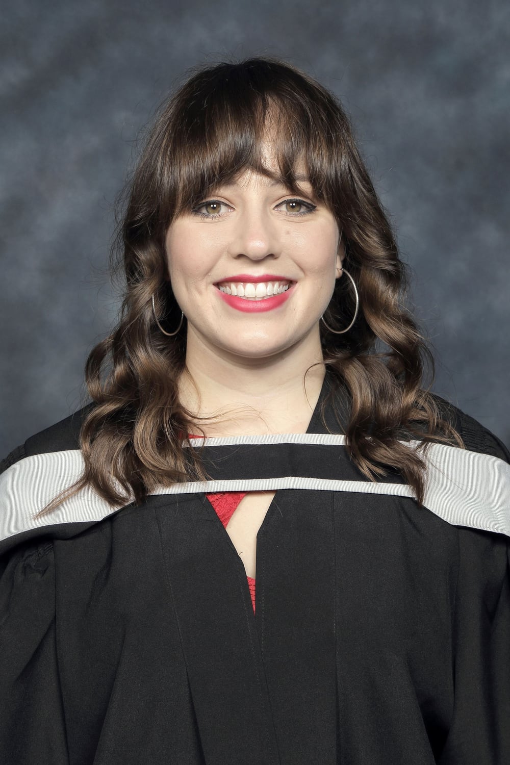 Dr Olivia Visentin in academic graduation gown